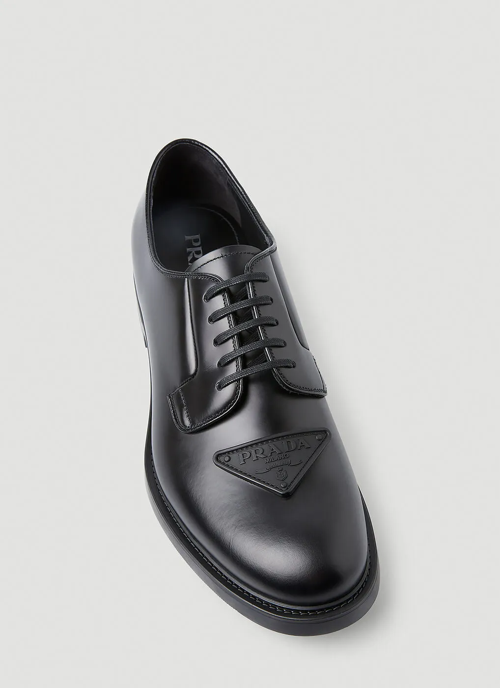 $1,150 PRADA - Black Brushed Triangle Plaque Leather Derby Lace-Ups - 12 US (11 Prada)