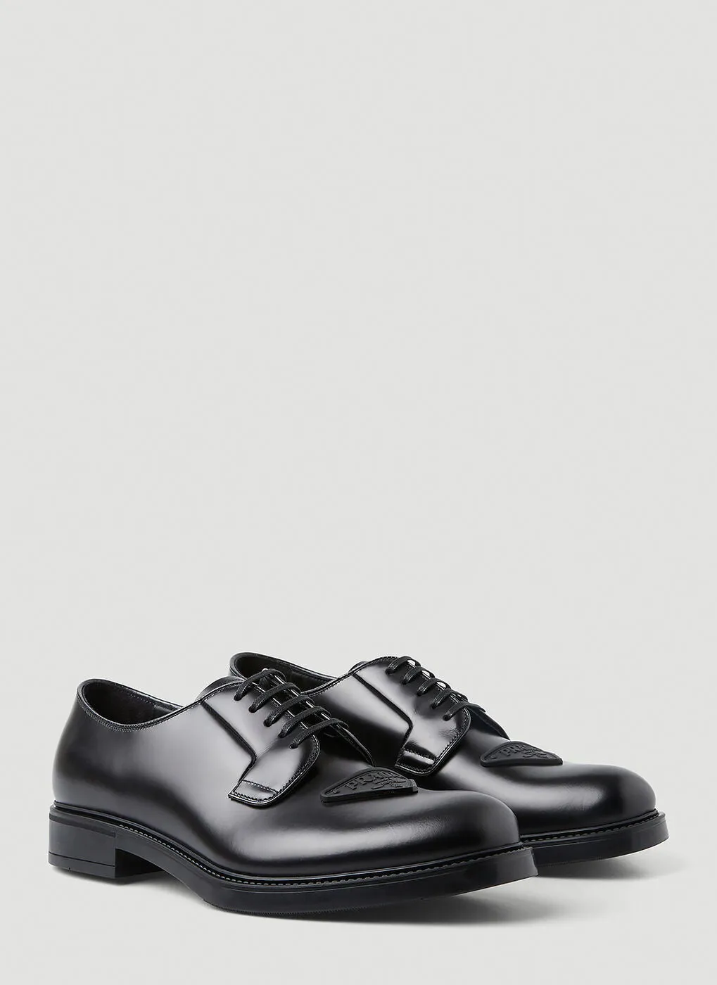 $1,150 PRADA - Black Brushed Triangle Plaque Leather Derby Lace-Ups - 12 US (11 Prada)