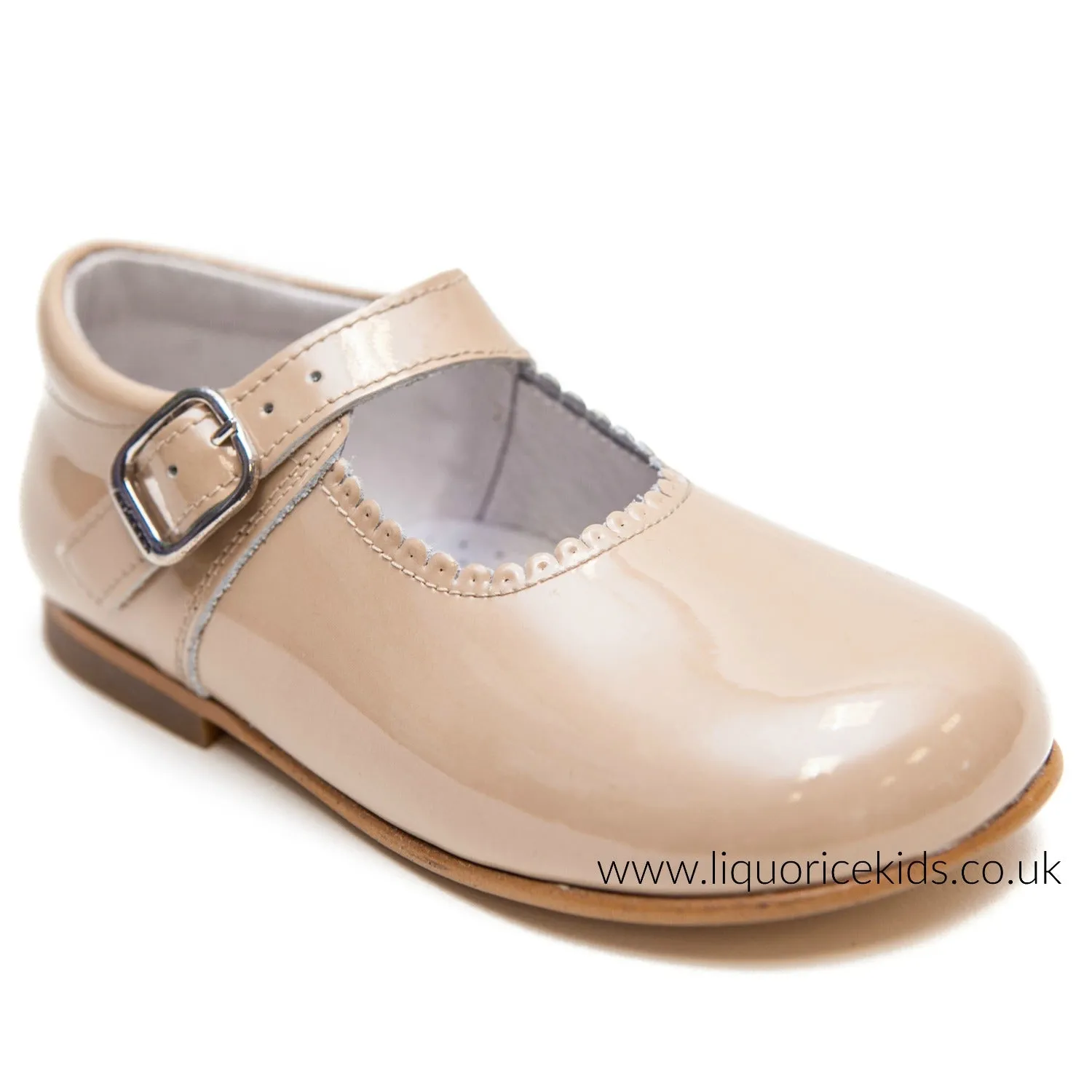 Andanines Girls Camel Patent Mary Janes With Scallop Edging.